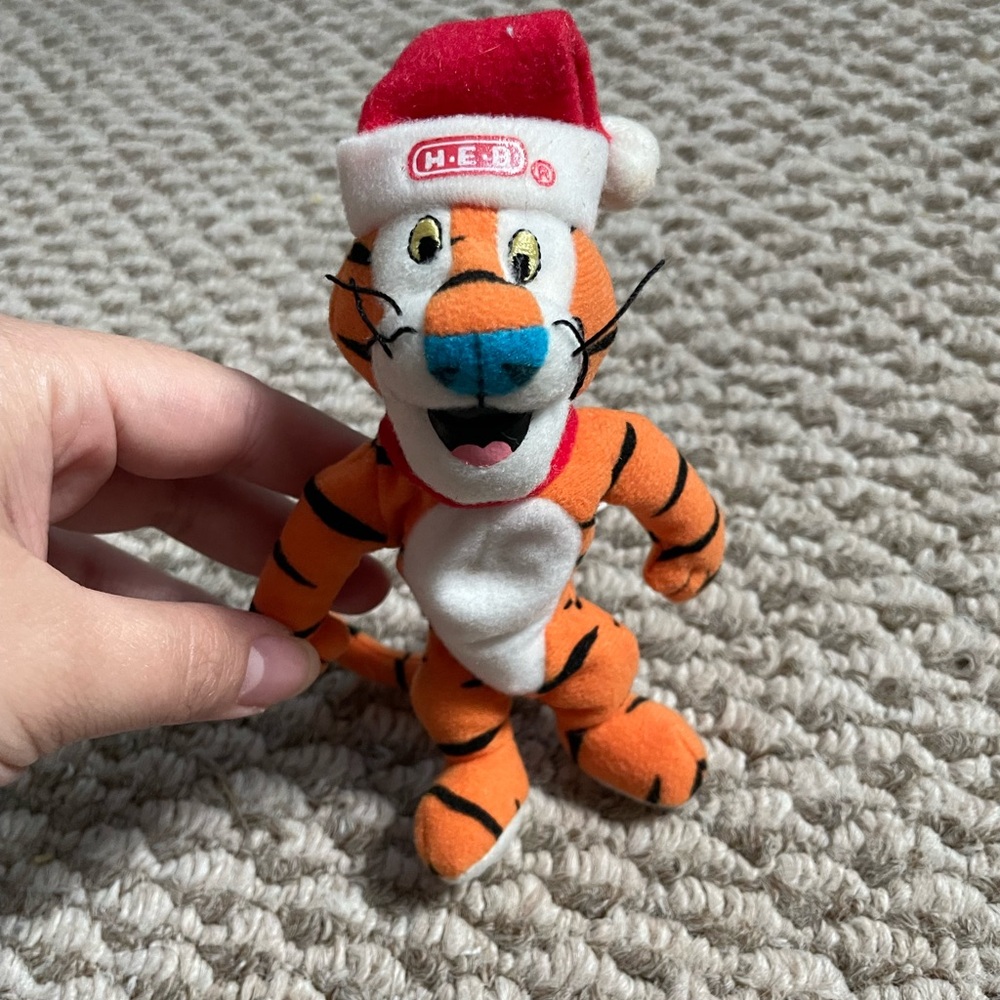 Festive Orange and White Tiger Plush with Santa Hat